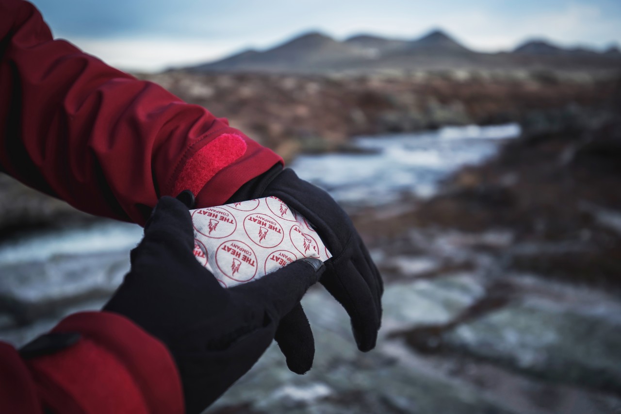 hand warmer is placed in an extra pocket of the glove