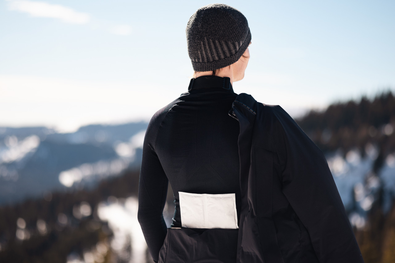 Man wears extra large warmer on lower back